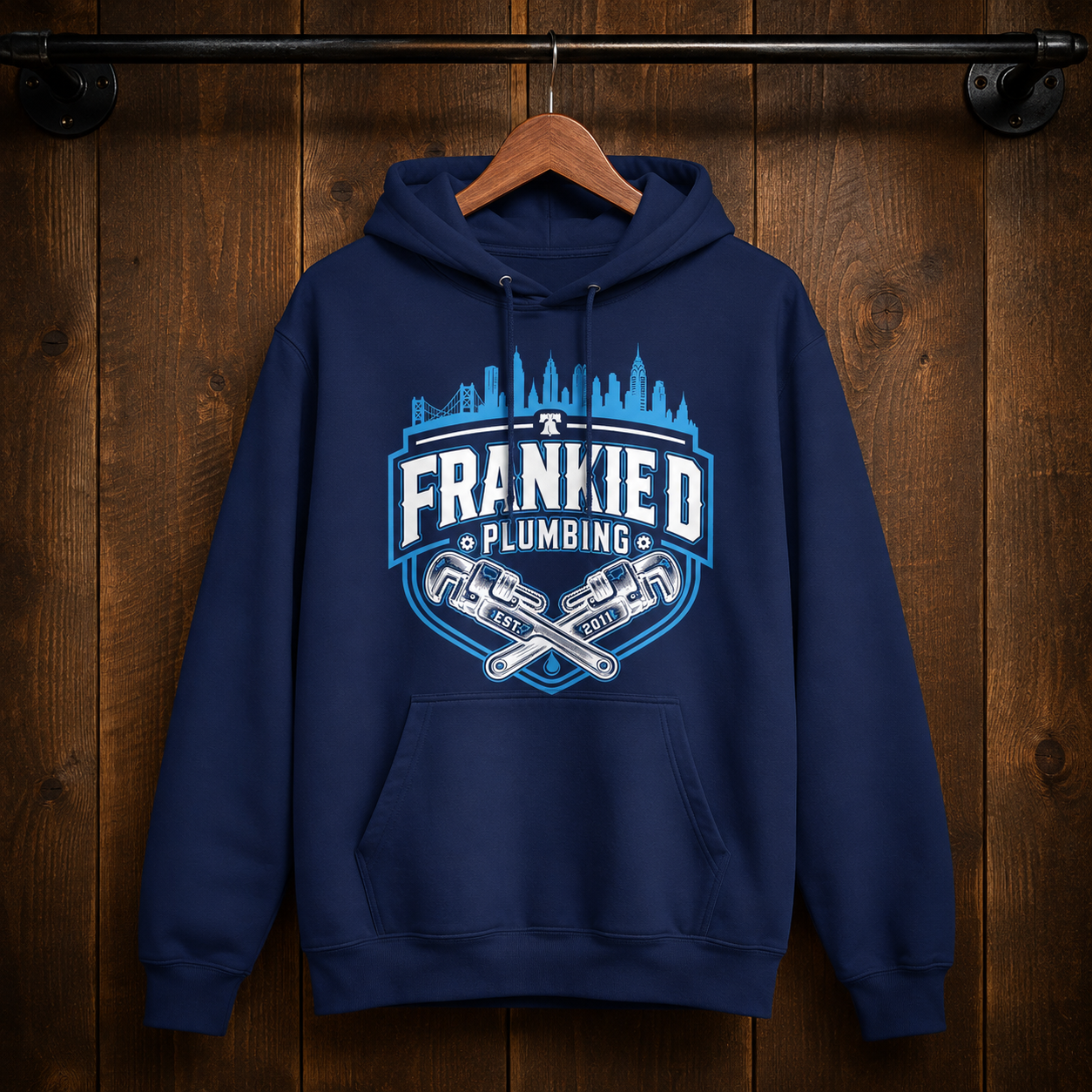 Custom navy hoodie designed for Frankie D Plumbing by Xtra Mile Printing